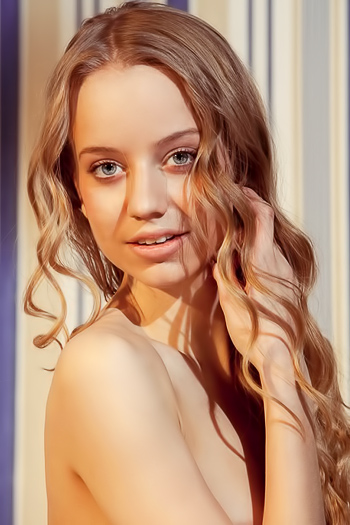 Drinking hot cocoa and getting naked gives her pleasure