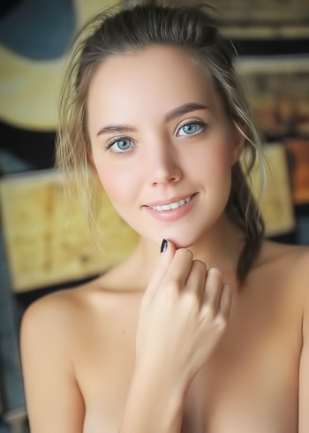 Tasteful front page photo shoot featuring a blue eyed teen