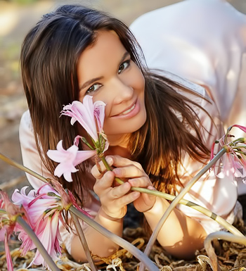 Her smile is more beautiful than the landscape
