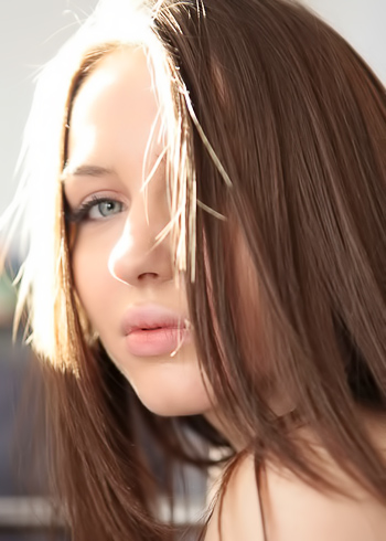 Tempting teen is looking gorgeous behind transparent curtain