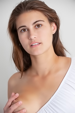 Nina Sphinx Uncovers Her Beautiful Big Breasts And Parts Her Thighs