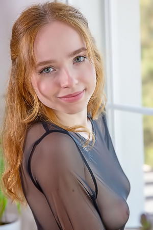 Rinna Ly Blue-eyed Sweetie’s Sultry Pout Gives Way To A Flirtatious Smile