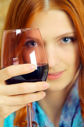 Relaxing after class with a glass of wine and no clothes